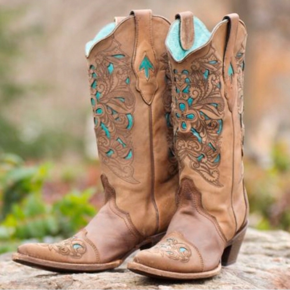 Woman’s turquoise Vintage Corral boots